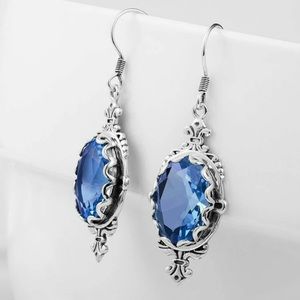 Blue gemstone dangle earrings